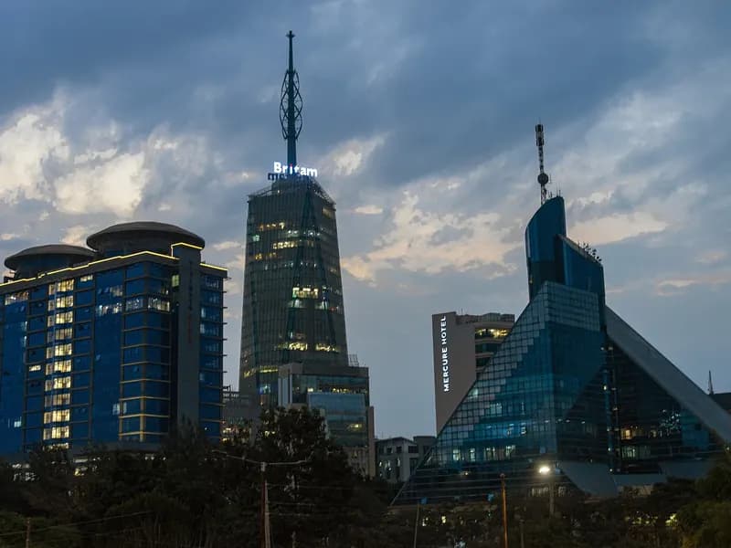 Britam Tower and surrounding buildings at blue hour from Radisson Blu hotel, Nairobi, KE